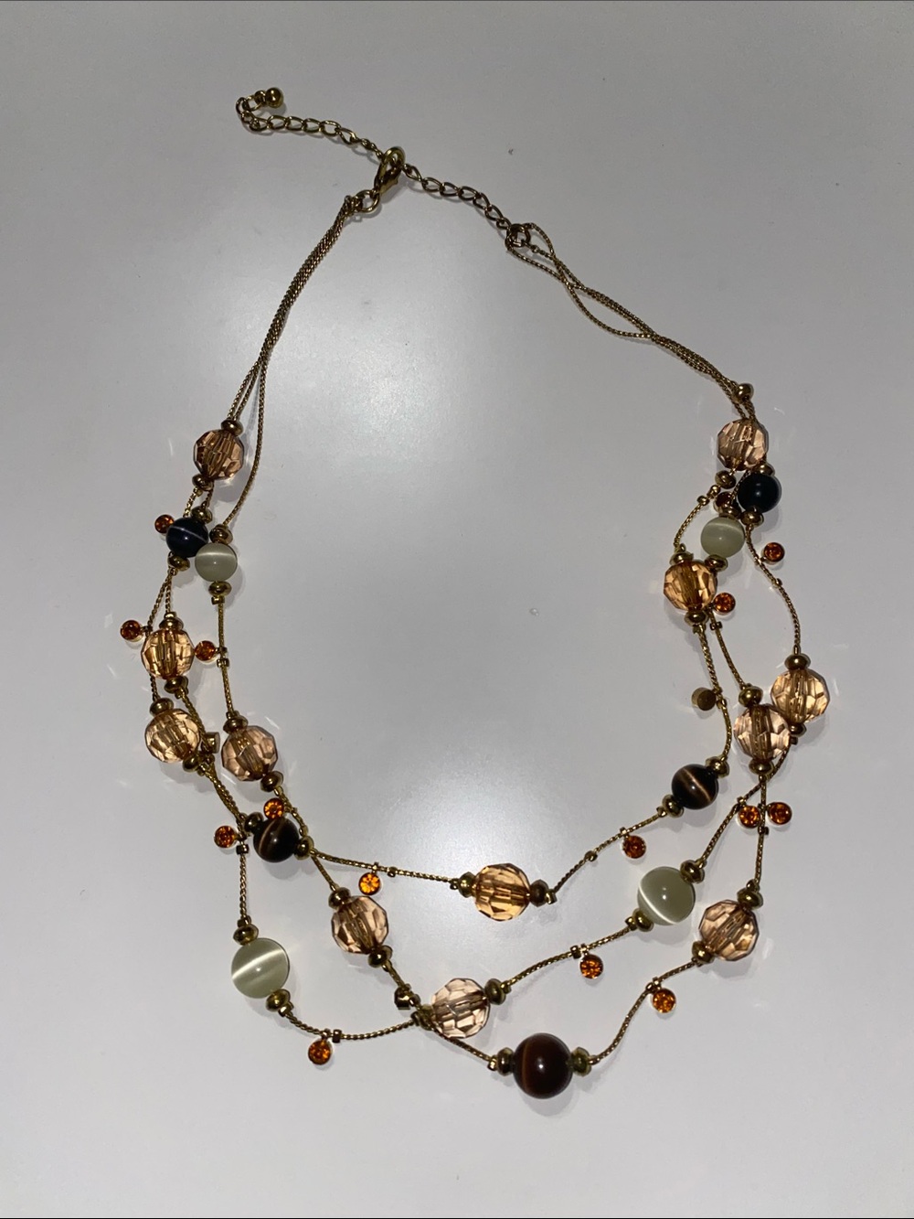 Multi-Strand Gold-Tone Beaded Necklace in Amber and Ivory